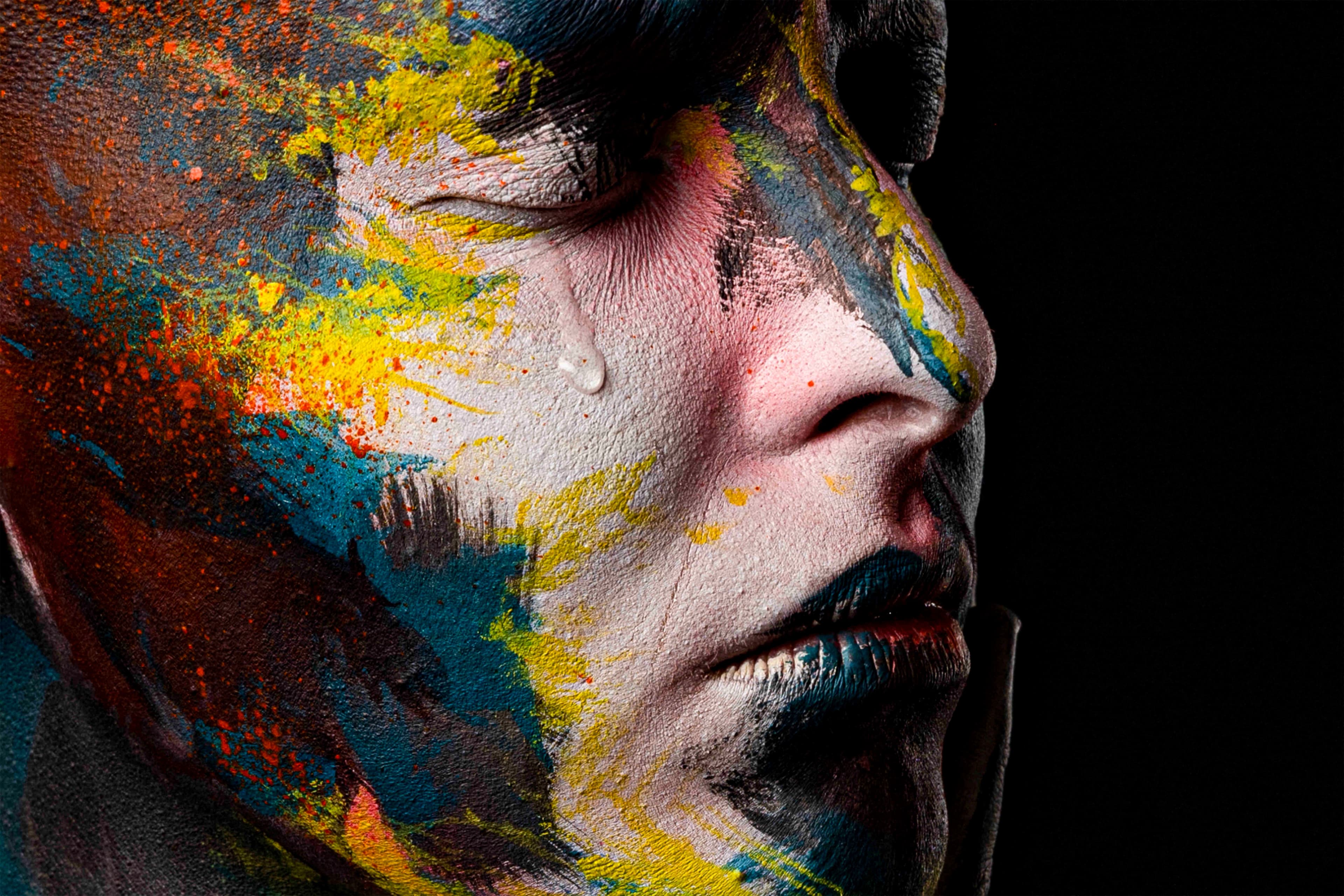 Rani Bruchstein gallery exhibition — vibrant body-paint artwork in a modern white gallery